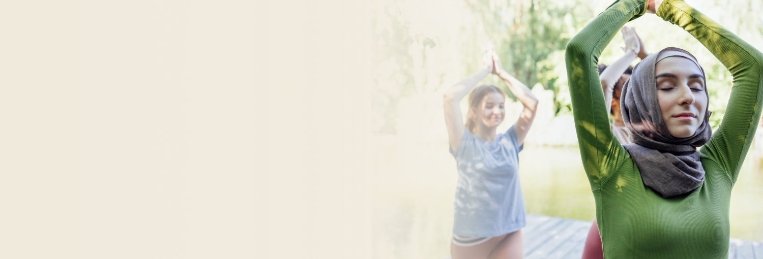 Group of people doing yoga outdoor